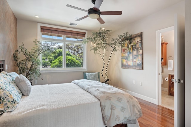 161 Wailea Ike Pl Unit D201, Kihei, HI 96753 - bedroom featuring wood finished floors, baseboards, and a ceiling fan
