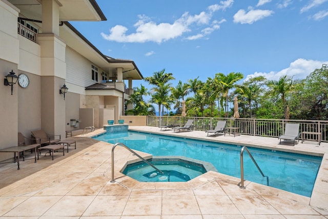 161 Wailea Ike Pl Unit D201, Kihei, HI 96753 - view of swimming pool featuring a patio and a pool with connected hot tub