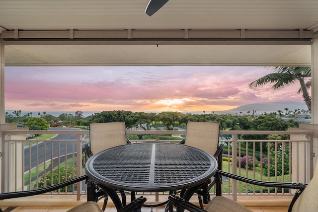161 Wailea Ike Pl Unit D201, Kihei, HI 96753 - balcony at dusk with outdoor dining area