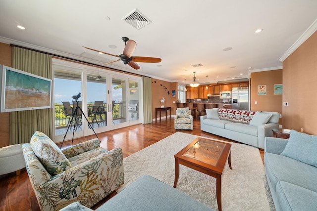 161 Wailea Ike Pl Unit D201, Kihei, HI 96753 - living room featuring crown molding, wood finished floors, ceiling fan, recessed lighting, and french doors