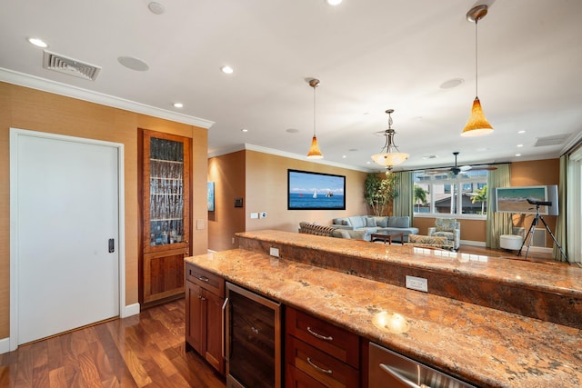 161 Wailea Ike Pl Unit D201, Kihei, HI 96753 - kitchen with wine cooler, dark wood-style floors, ornamental molding, open floor plan, and light stone countertops