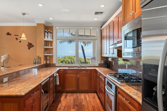161 Wailea Ike Pl Unit D201, Kihei, HI 96753 - kitchen with appliances with stainless steel finishes, a sink, brown cabinets, ornamental molding, and beverage cooler