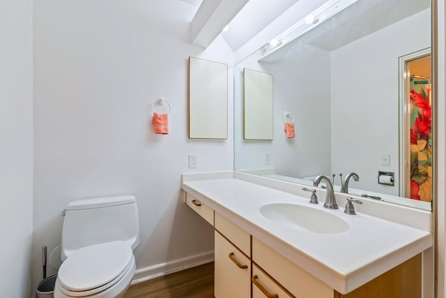 50 Puu Anoano St Unit 503, Lahaina, HI 96761 - bathroom with vanity, wood finished floors, baseboards, and toilet