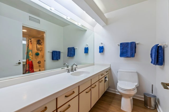 50 Puu Anoano St Unit 503, Lahaina, HI 96761 - full bath featuring wood finished floors, vanity, toilet, curtained shower, and baseboards