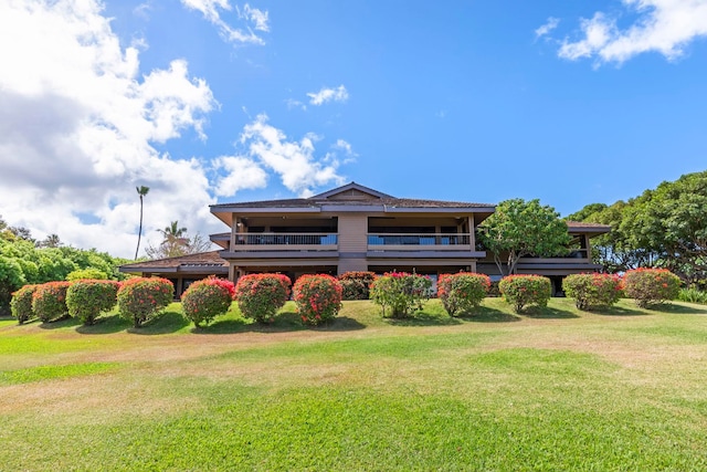 50 Puu Anoano St Unit 503, Lahaina, HI 96761 - rear view of house with a yard