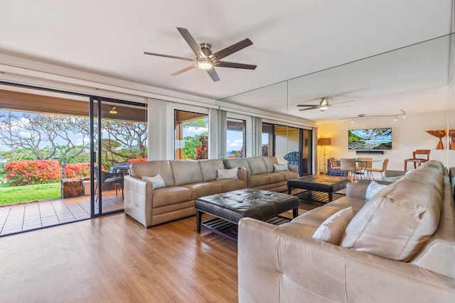 50 Puu Anoano St Unit 503, Lahaina, HI 96761 - living room featuring ceiling fan and healthy amount of natural light