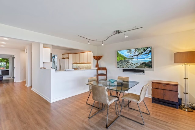 50 Puu Anoano St Unit 503, Lahaina, HI 96761 - dining space featuring light wood finished floors and baseboards