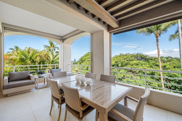 view of patio / terrace with a balcony and outdoor lounge area