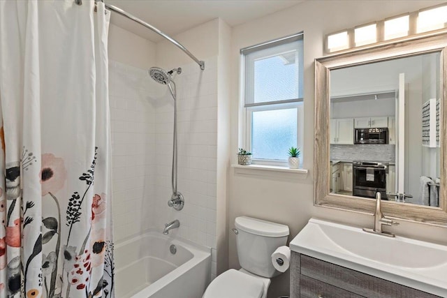 full bathroom with vanity, toilet, shower / bath combo with shower curtain, and tasteful backsplash