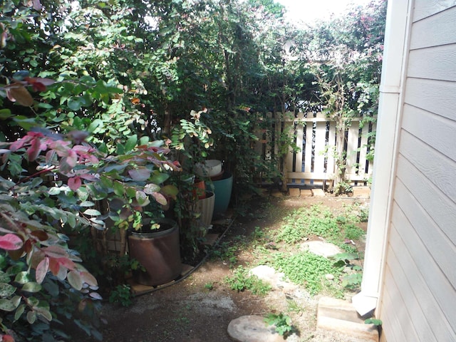 view of yard featuring fence