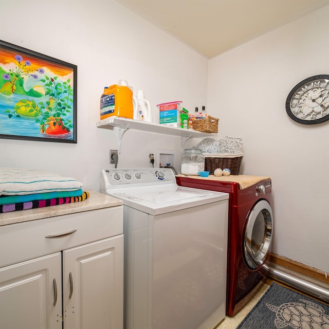 laundry room with independent washer and dryer