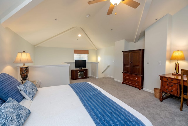 carpeted bedroom featuring ceiling fan and vaulted ceiling