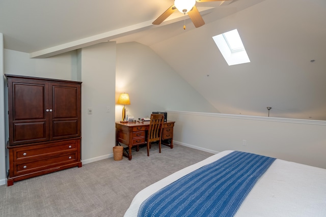 bedroom with ceiling fan, light colored carpet, and vaulted ceiling