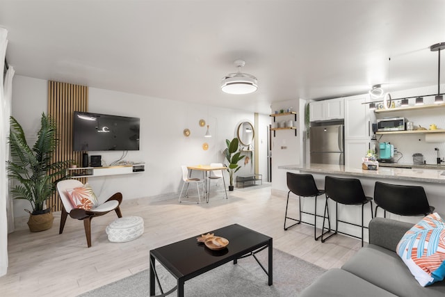 3559 Lower Honoapiilani Rd Unit 709, Lahaina, HI 96761 - living area with light wood finished floors
