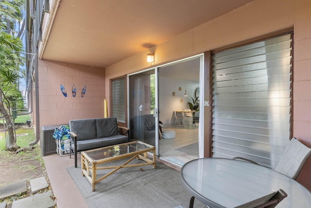 3559 Lower Honoapiilani Rd Unit 709, Lahaina, HI 96761 - view of patio / terrace with an outdoor living space and central air condition unit