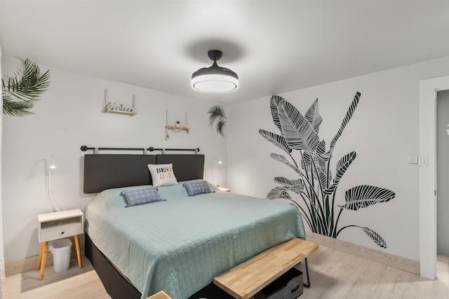 3559 Lower Honoapiilani Rd Unit 709, Lahaina, HI 96761 - bedroom with baseboards and light wood-type flooring
