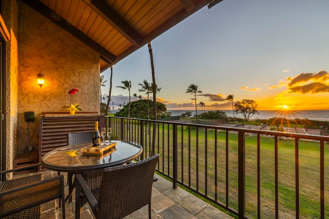 view of balcony at dusk