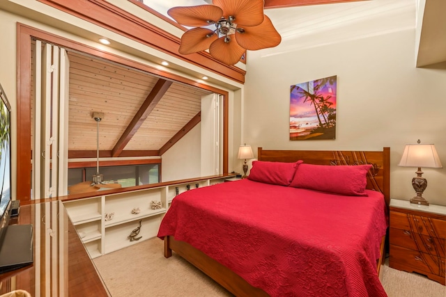 carpeted bedroom with ceiling fan, lofted ceiling with beams, and wooden ceiling