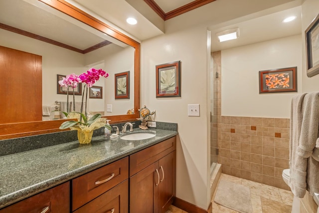 bathroom with vanity, a shower, crown molding, and toilet