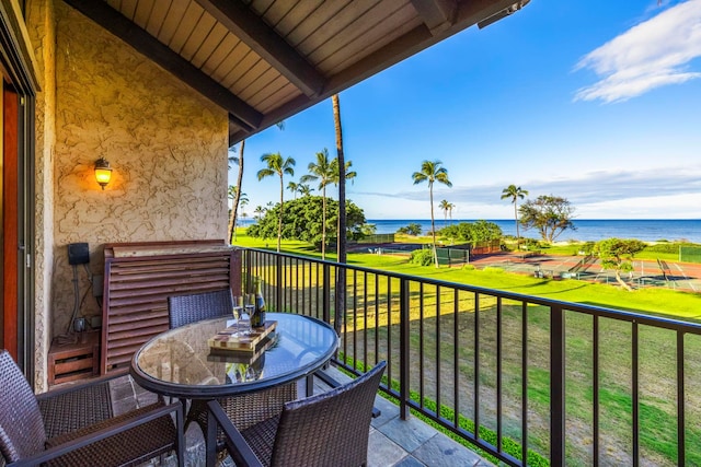 balcony featuring a water view