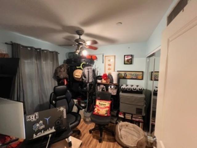 44 Kanani Rd Unit 1-104, Kihei, HI 96753 - interior space featuring wood finished floors and ceiling fan