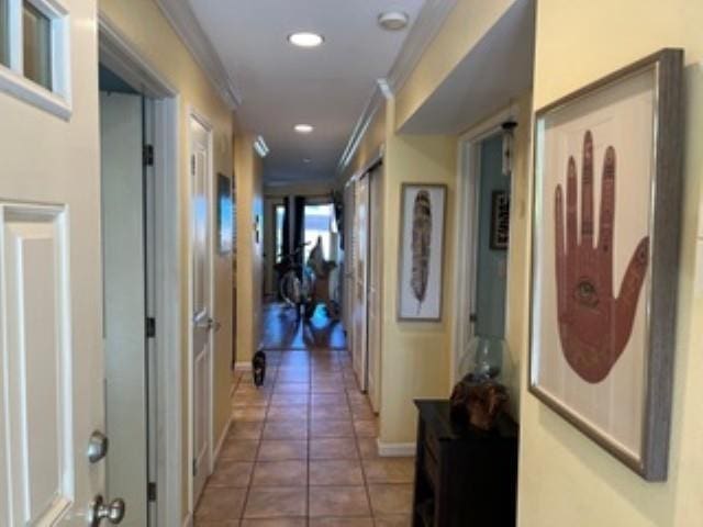 44 Kanani Rd Unit 1-104, Kihei, HI 96753 - hallway with crown molding, tile patterned floors, and recessed lighting