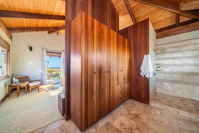 stairs featuring beam ceiling, high vaulted ceiling, ceiling fan, and wooden ceiling