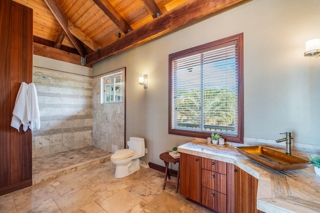 bathroom featuring vanity, wooden ceiling, vaulted ceiling with beams, toilet, and walk in shower