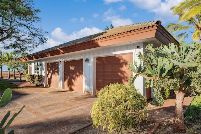 exterior space featuring a garage