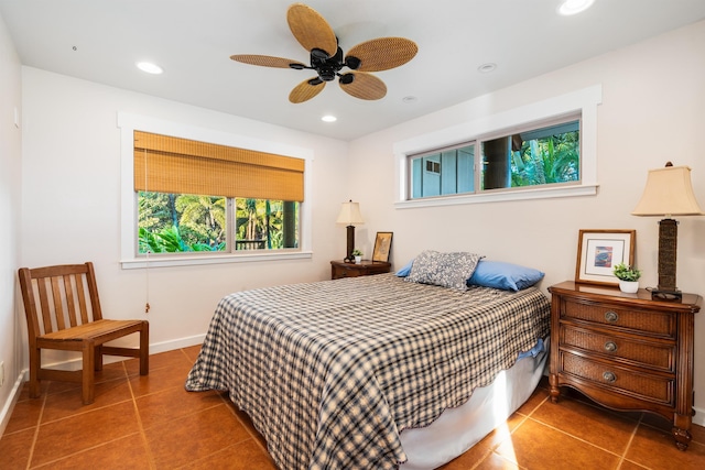 tiled bedroom with ceiling fan