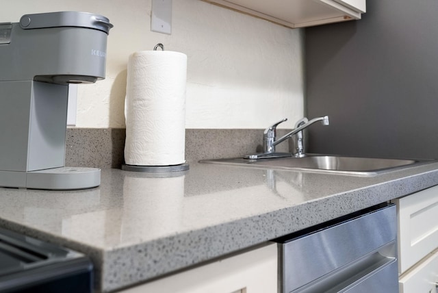 details with sink and stainless steel dishwasher