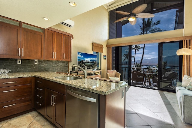 kitchen featuring decorative backsplash, ceiling fan, dishwasher, a sink, and light tile patterned flooring