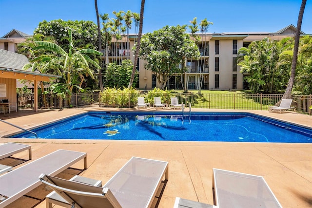 view of swimming pool with a patio area