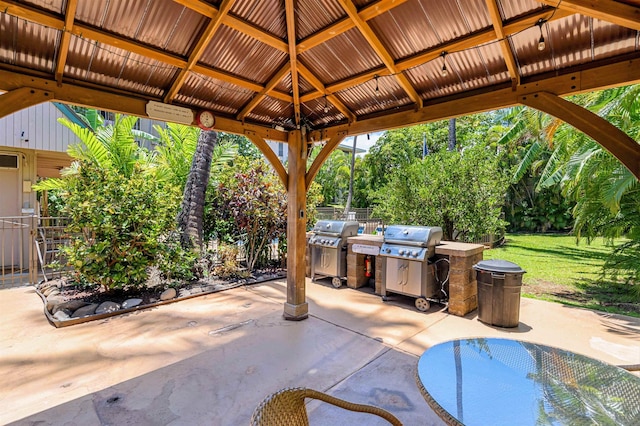 view of patio with a gazebo and area for grilling