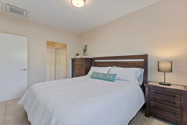 160 Keonekai Rd Unit 11-201, Kihei, HI 96753 - bedroom featuring light tile patterned floors and a closet
