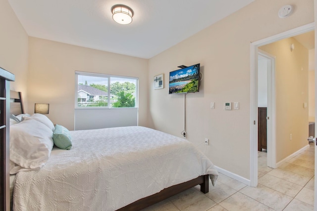 160 Keonekai Rd Unit 11-201, Kihei, HI 96753 - bedroom featuring light tile patterned floors and baseboards