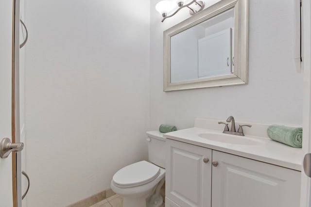 160 Keonekai Rd Unit 11-201, Kihei, HI 96753 - half bathroom featuring vanity, toilet, and tile patterned floors