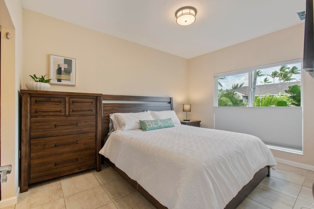 160 Keonekai Rd Unit 11-201, Kihei, HI 96753 - bedroom featuring light tile patterned floors and baseboards