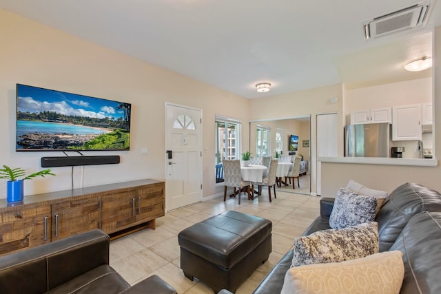 160 Keonekai Rd Unit 11-201, Kihei, HI 96753 - living area with light tile patterned floors and baseboards