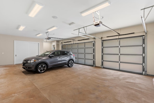 garage featuring a garage door opener