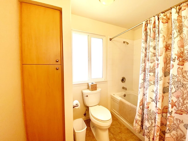 bathroom featuring toilet, tile patterned floors, and shower / bathtub combination with curtain