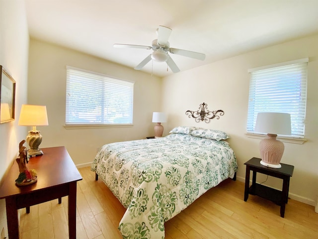 bedroom featuring ceiling fan and light hardwood / wood-style floors