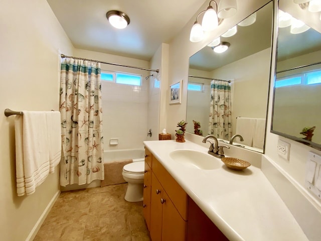 full bathroom with vanity, toilet, and shower / tub combo with curtain