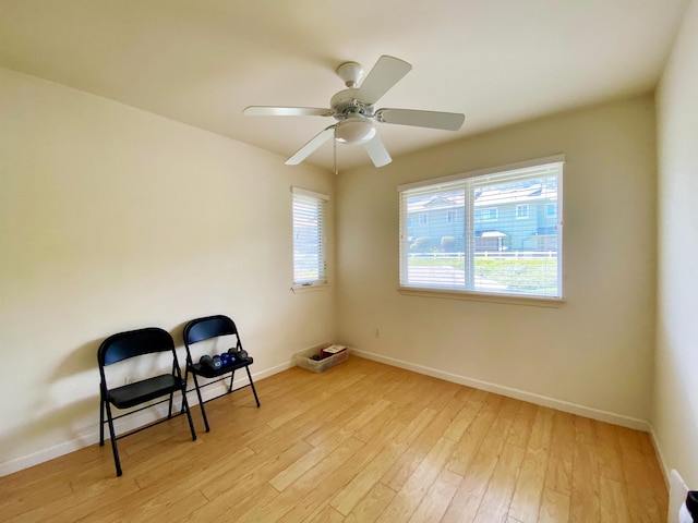 unfurnished room with ceiling fan and light hardwood / wood-style floors