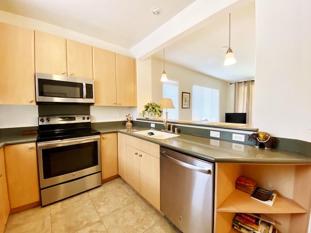 kitchen featuring beamed ceiling, stainless steel appliances, sink, hanging light fixtures, and light brown cabinets