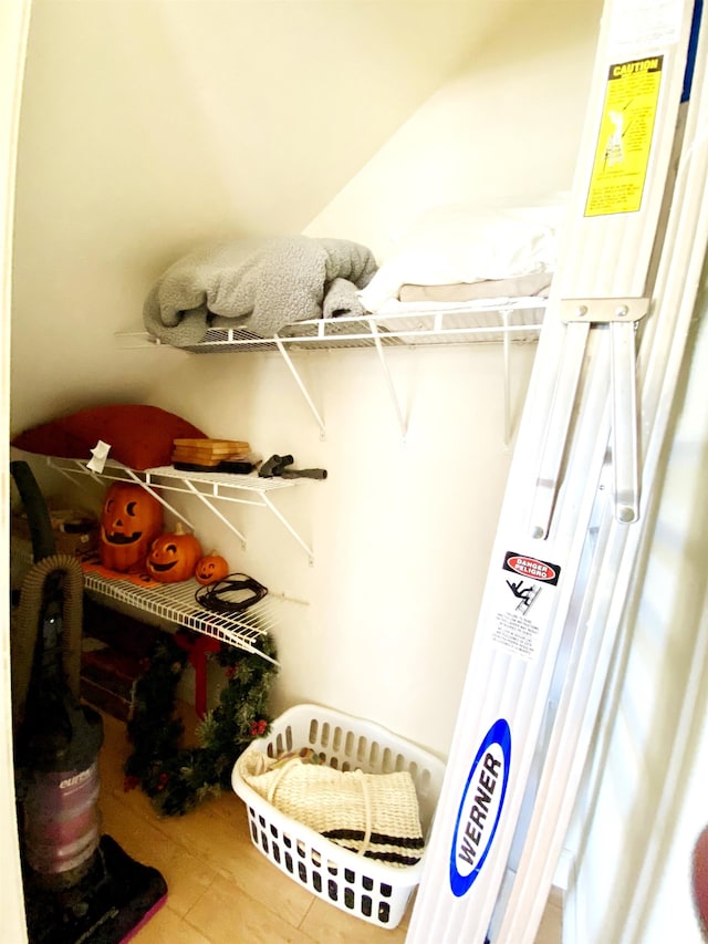 walk in closet featuring hardwood / wood-style floors