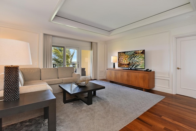1 Ritz Carlton Dr Unit 1626, Lahaina, HI 96761 - living area featuring crown molding, a raised ceiling, dark wood finished floors, and a decorative wall