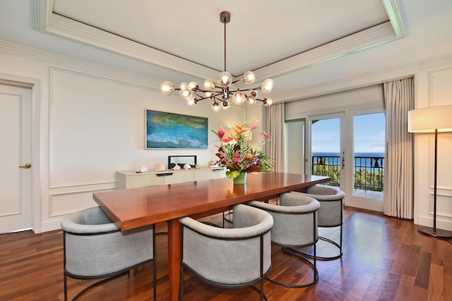 1 Ritz Carlton Dr Unit 1626, Lahaina, HI 96761 - dining area featuring a tray ceiling, ornamental molding, a chandelier, dark wood-style floors, and a water view