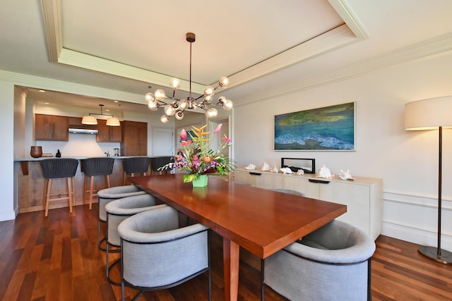 1 Ritz Carlton Dr Unit 1626, Lahaina, HI 96761 - dining room featuring a tray ceiling, ornamental molding, a chandelier, and dark wood-type flooring