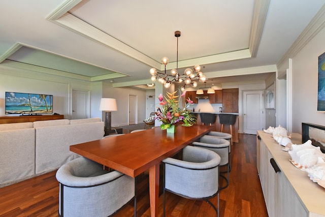 1 Ritz Carlton Dr Unit 1626, Lahaina, HI 96761 - dining room featuring a raised ceiling, dark wood-type flooring, a chandelier, and crown molding